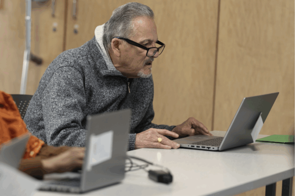 John Castro looks at his computer during a keyboard basics class offered by Free Geek on Thursday, May 15, 2025, in Portland, Ore. (AP Photo/Jenny Kane)